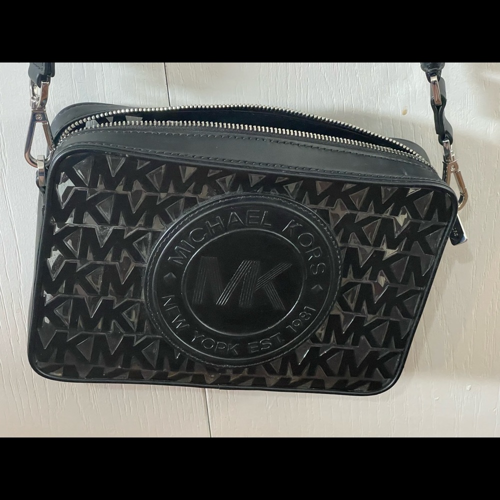 Mk clear bag. Little spot on the strap.
